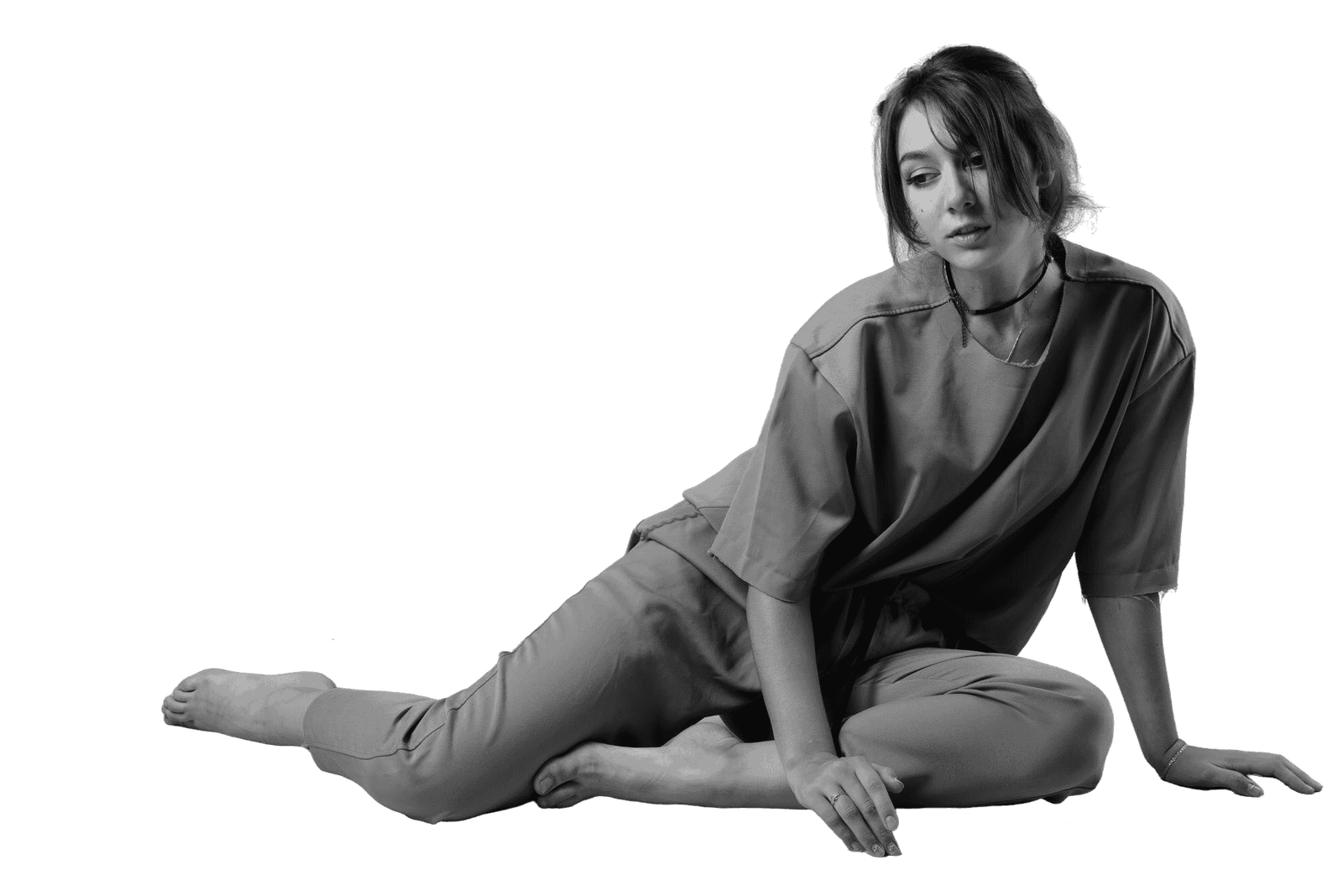 portrait-woman-sitting-against-wall